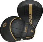 Black and gold focus pads with 'RDX' branding on a white background