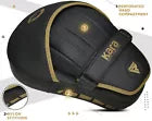 Black and gold focus pad with brand logo on a white background