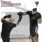 Two men practising martial arts with focus pads on a white background.
