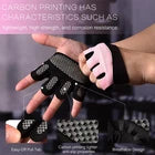Black carbon fiber print gloves with studded details on a white background