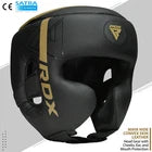 Black boxing headguard with gold accents on a white background