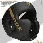 Black boxing headguard with gold logo on a white background