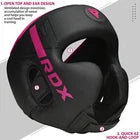 Black boxing headguard with pink branding on a white background