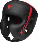Black and red boxing headguard with 'RDX' branding on a white background