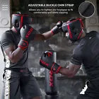 Two boxers in red boxing gloves training wearing headguards