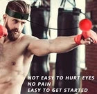 Man training with reflex ball.