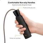Person holding a black skipping rope with non-slip handles