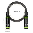 Black skipping rope with green accents on a white background