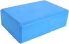 Blue yoga block on a white background