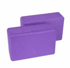 Two purple yoga blocks on a white background