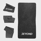 Black towel with 'BEYOND' branding on a white background.
